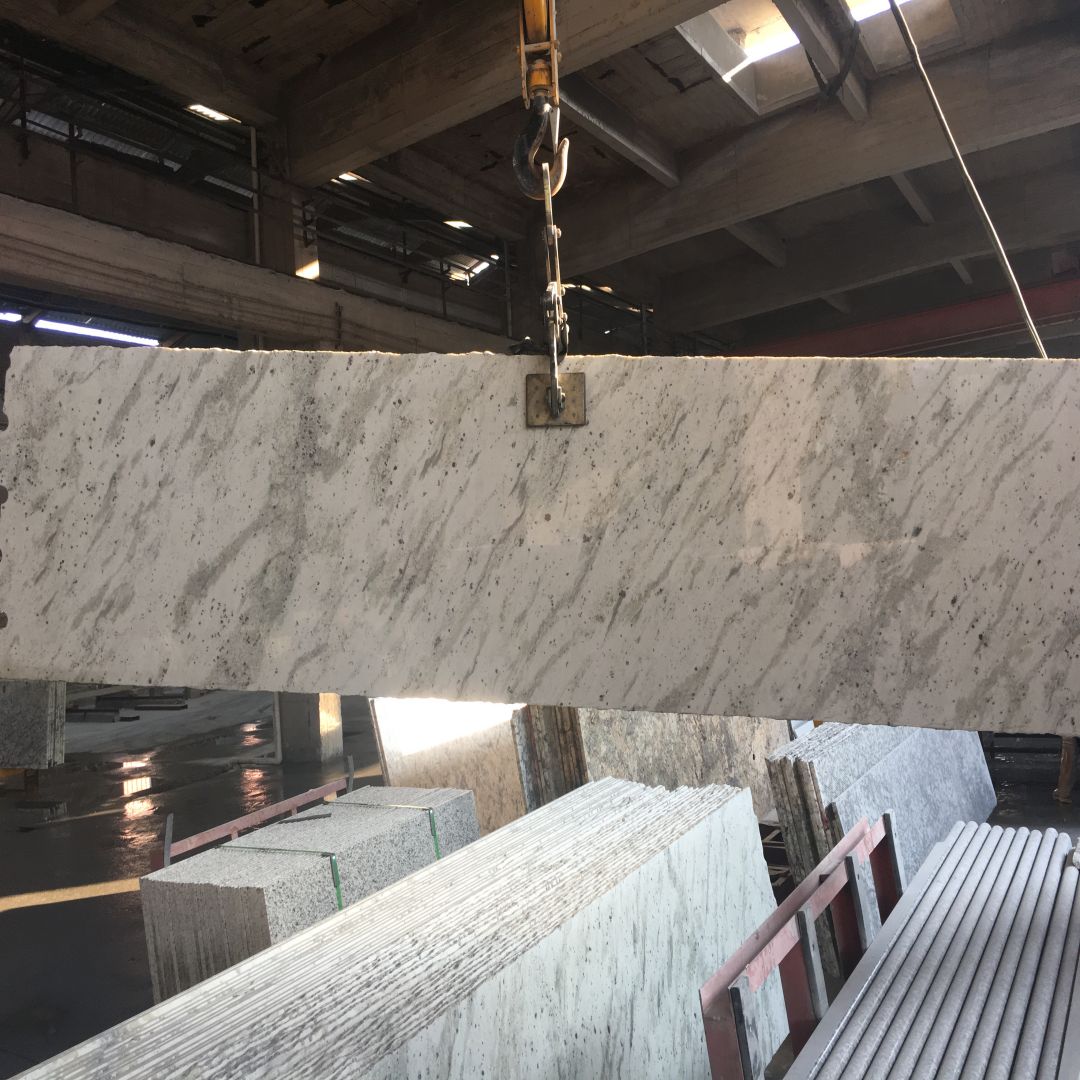 Polished Granite Andromeda White countertop in a modern kitchen